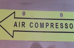 TAG,AIR COMPRESSOR DIRECTIONAL ARROW,1 1/2 X 7,SEA FOAM BACKGROUND W/BOLD BLACK LETTERS,LAMINATED,BUILD