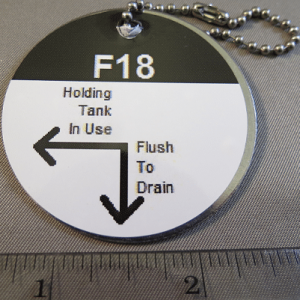 TAG,SS,HOLDING TANK IN USE/FLUSH TO DRAIN,F18,CHICK-FIL-A